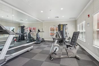 Fitness center with cardio and strength training equipment